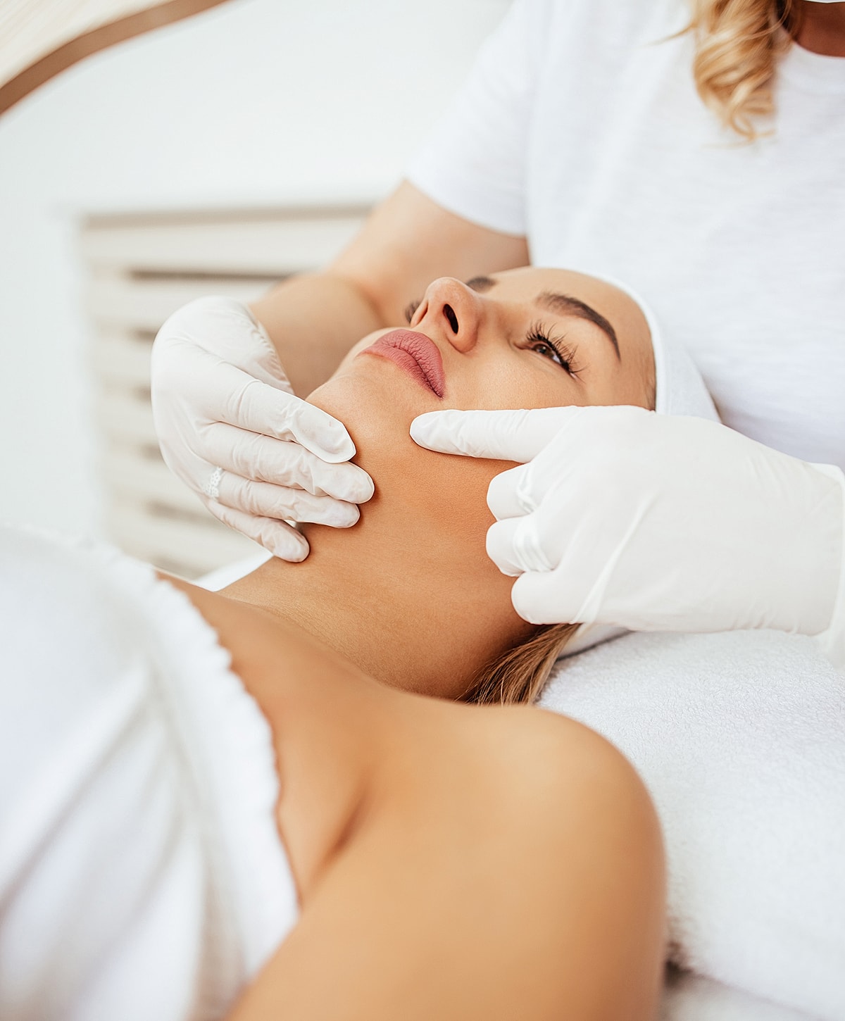 Facial treatment session at a spa or clinic.
