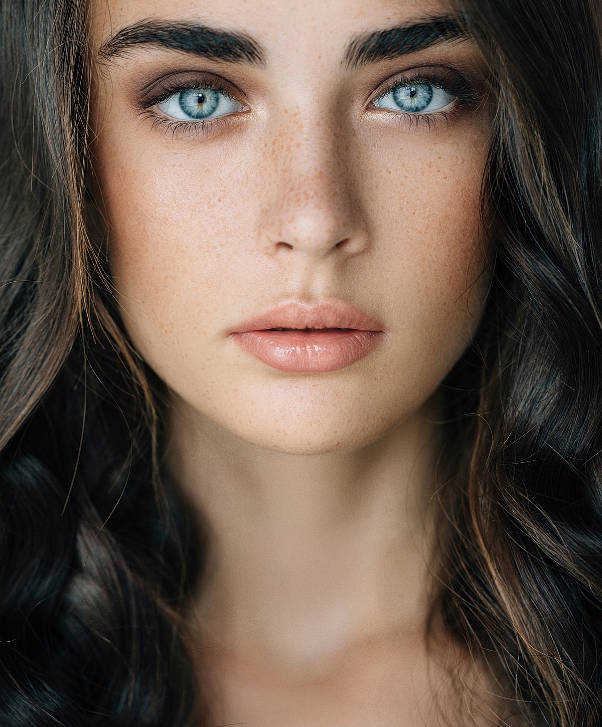 Close-up of a young woman's face.