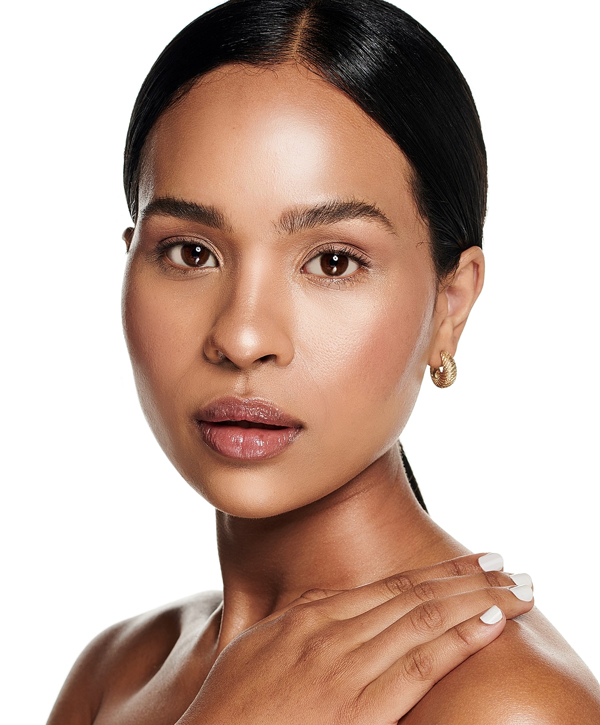 Close-up of a woman's face, showcasing natural beauty.