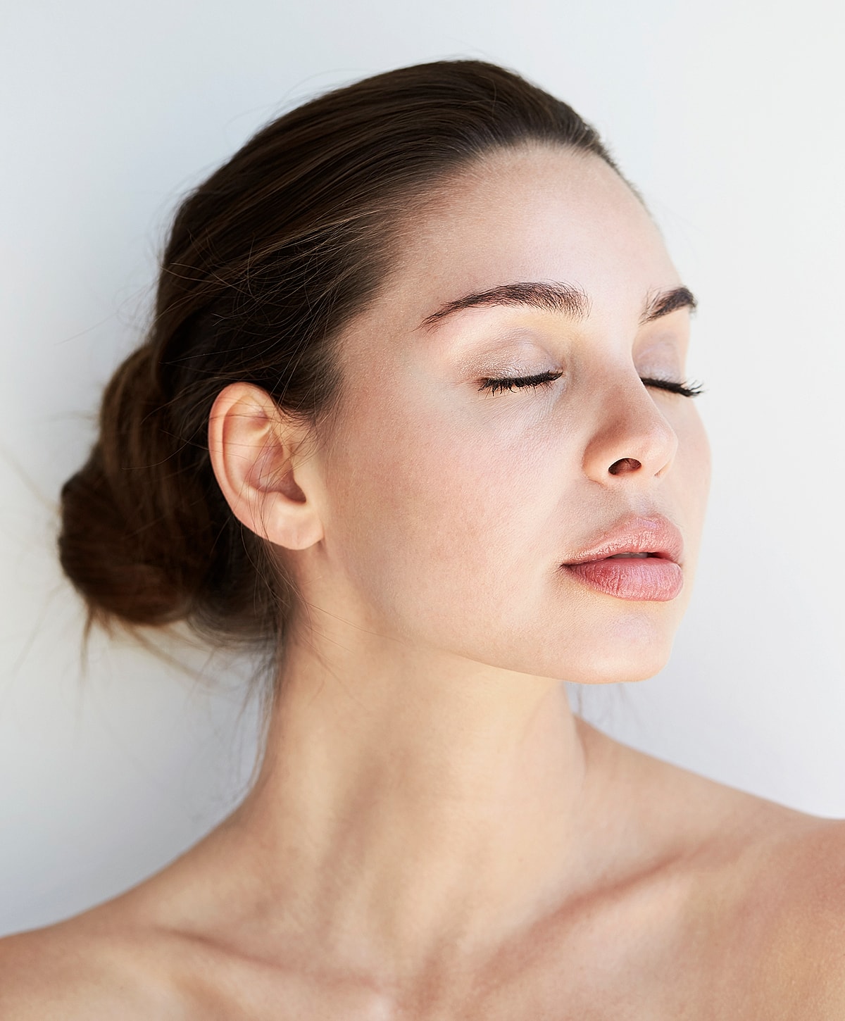 Woman with closed eyes and natural beauty